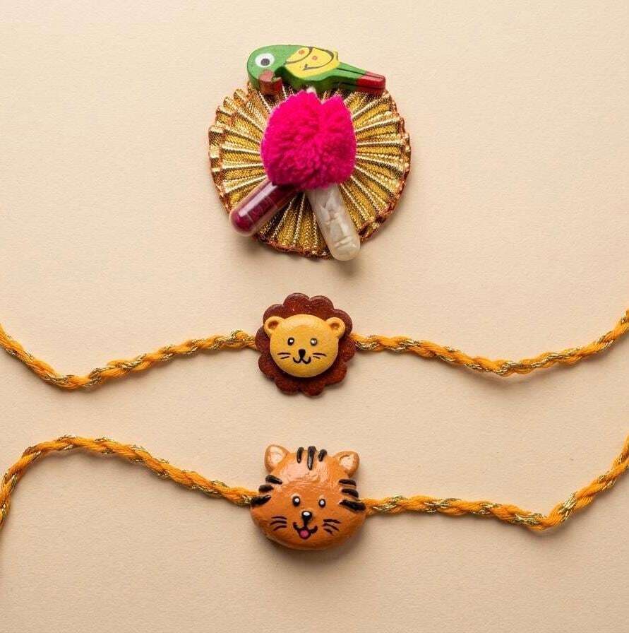 Kids Tie Bracelet / Cartoon Rakhi ( Lion , Tiger  ) clay handmade Rakhi