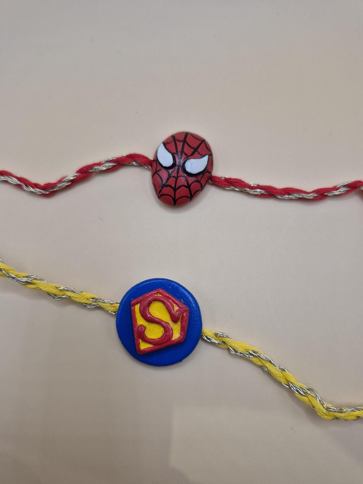 Kids Tie Bracelet / Cartoon Rakhi ( spider man , super man ) Clay Handmade Rakhi