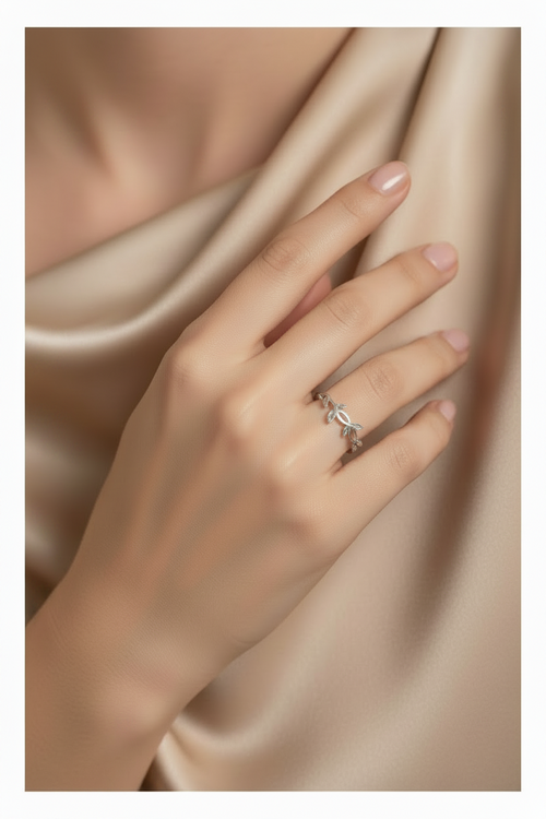 Nature-inspired sterling silver leaf ring worn on finger botanical jewellery UK