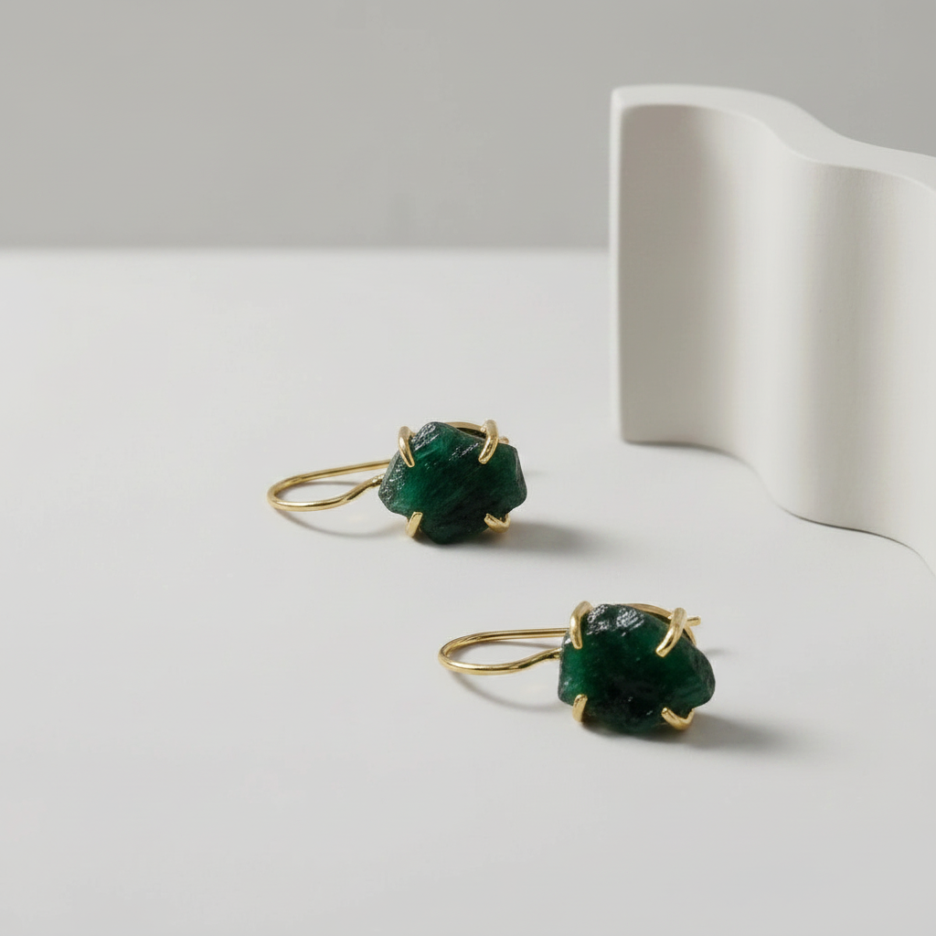 Green Aventurine stone earrings with gold plated hooks on a light grey background