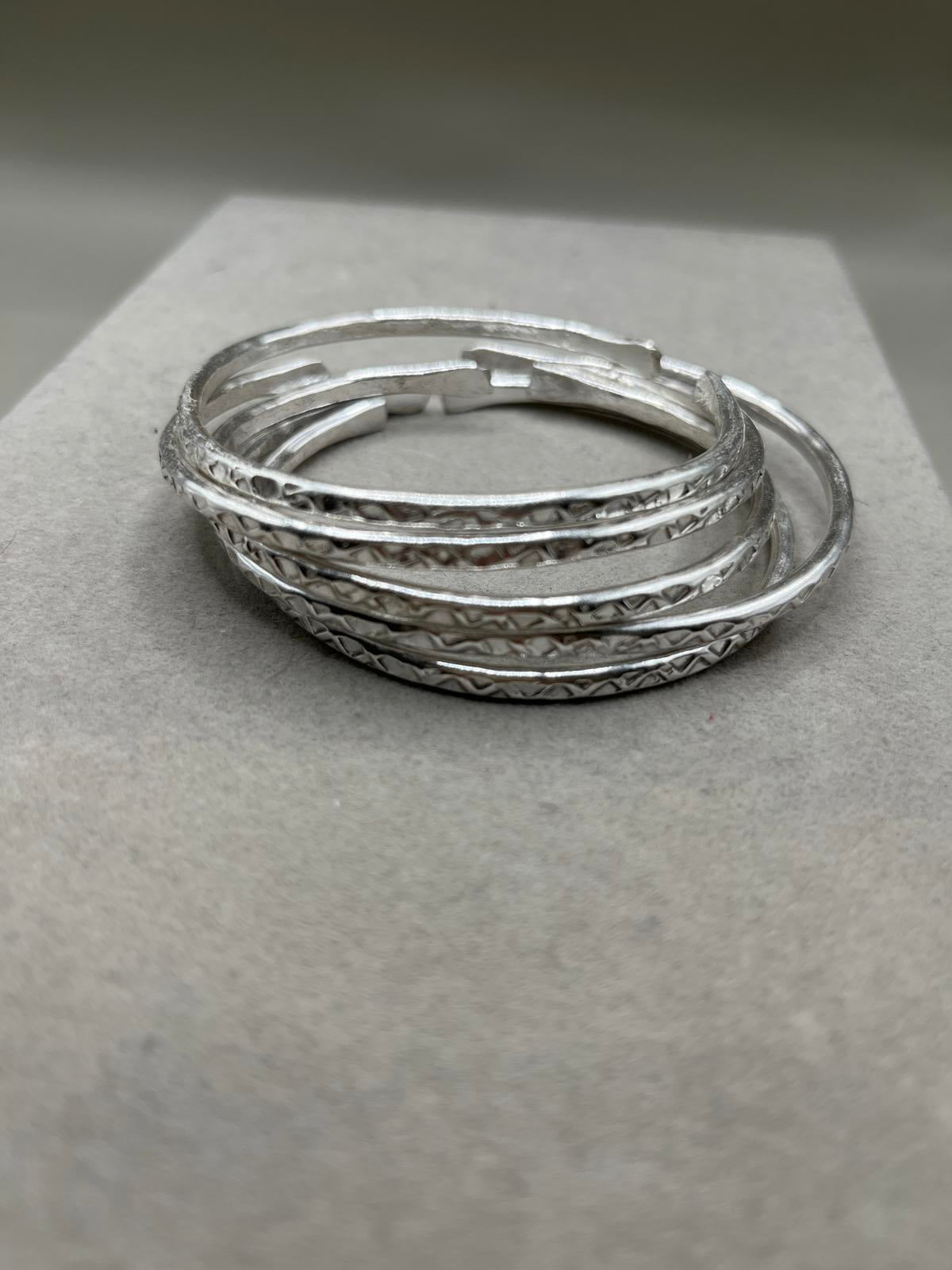 Silver Hammered bangles ( set of 5)