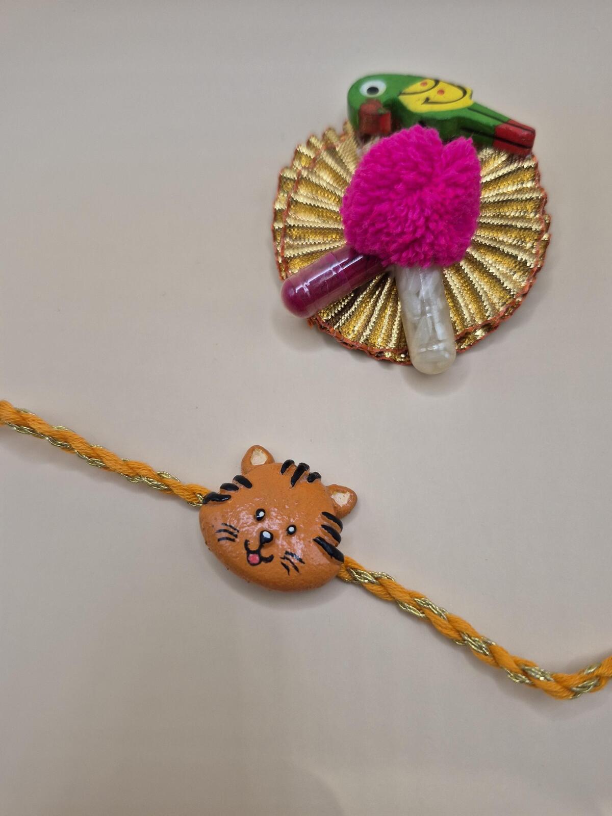 Kids Tie Bracelet / Cartoon Rakhi ( Lion , Tiger  ) clay handmade Rakhi