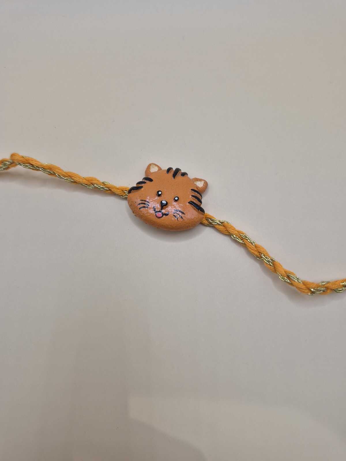 Kids Tie Bracelet / Cartoon Rakhi ( Lion , Tiger  ) clay handmade Rakhi