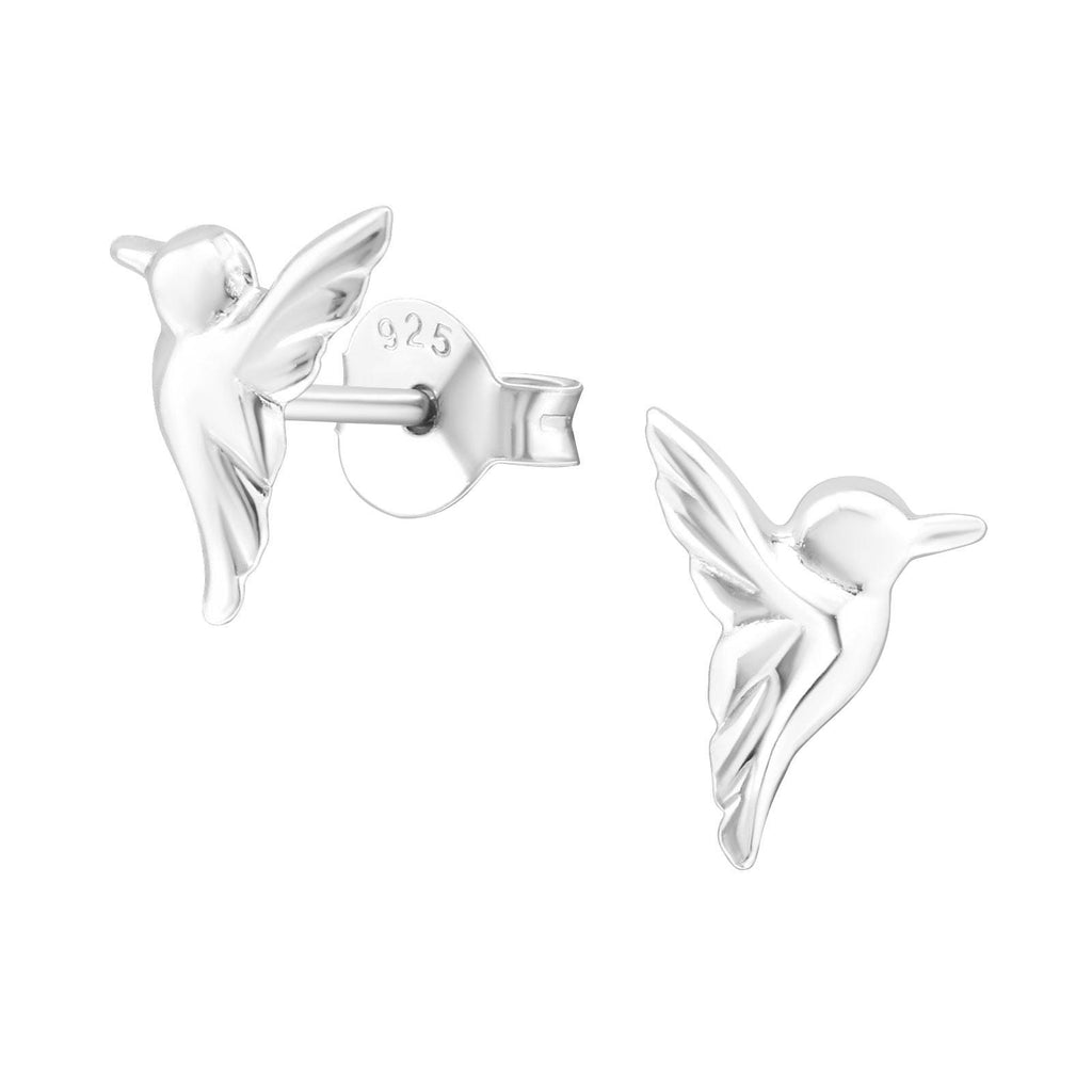 Close-up detail of tiny hummingbird stud earrings